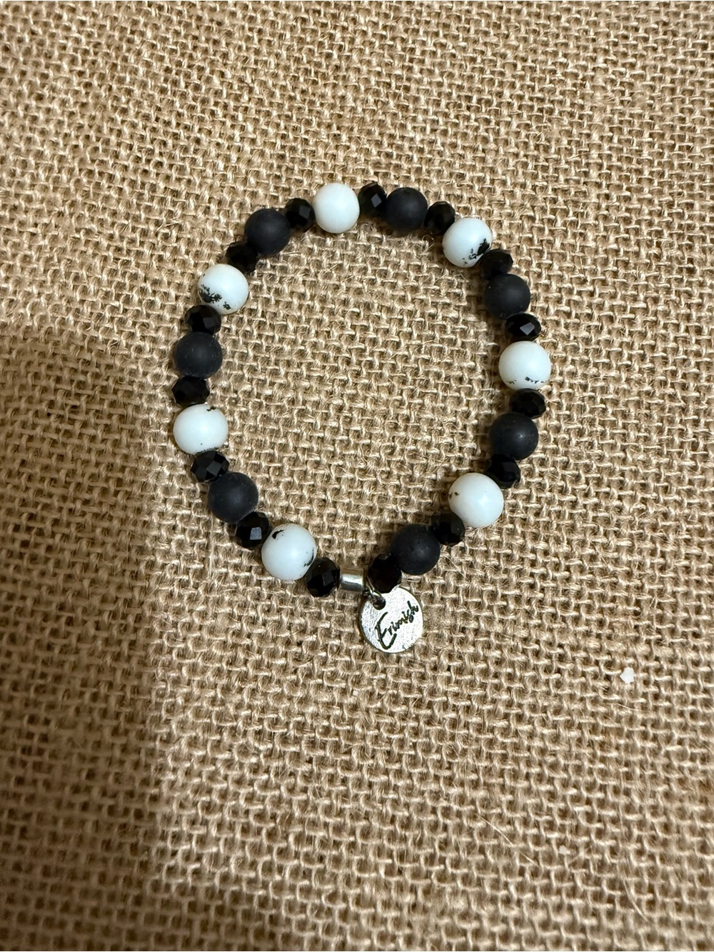 Erimish Black & White Beaded Stretch Bracelet with Logo Charm